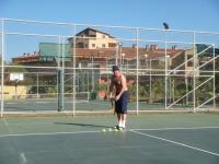 Тренировка на теннисном корте отеля